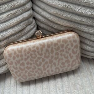 Elegant Cream Clutch with Gold Accents